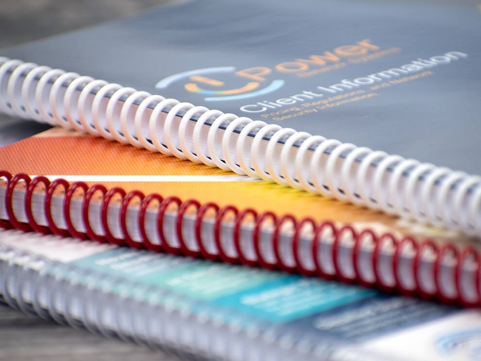 Custom spiral bound booklets printed by Brand Impact
